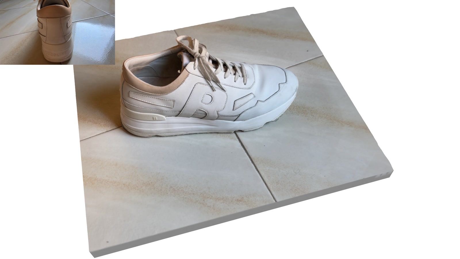 Reconstructed white shoe on a captured tile surface, with the original product reference in the upper left